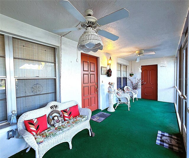 interior space featuring ceiling fan