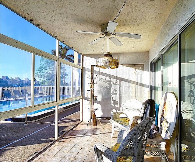 4116 SE 20th Pl Unit 102, Cape Coral, FL 33904 - sunroom featuring a ceiling fan