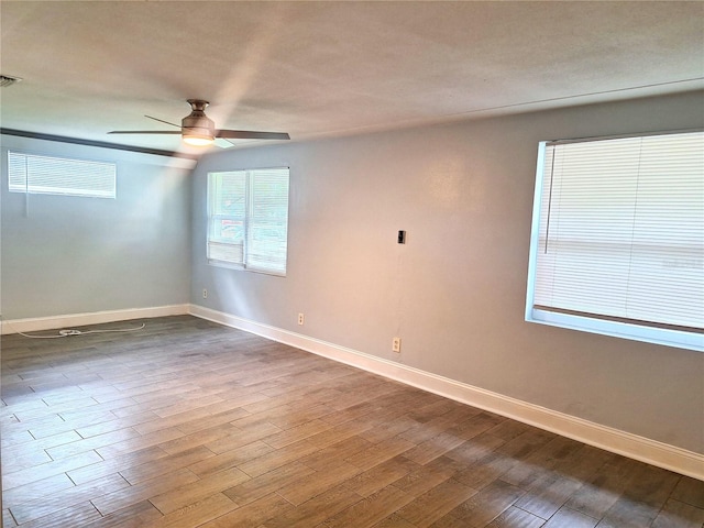 unfurnished room featuring ceiling fan and wood-type flooring