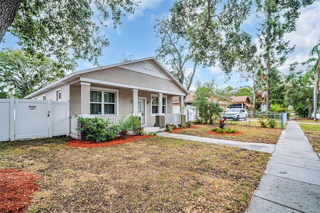 bungalow-style home featuring covered porch