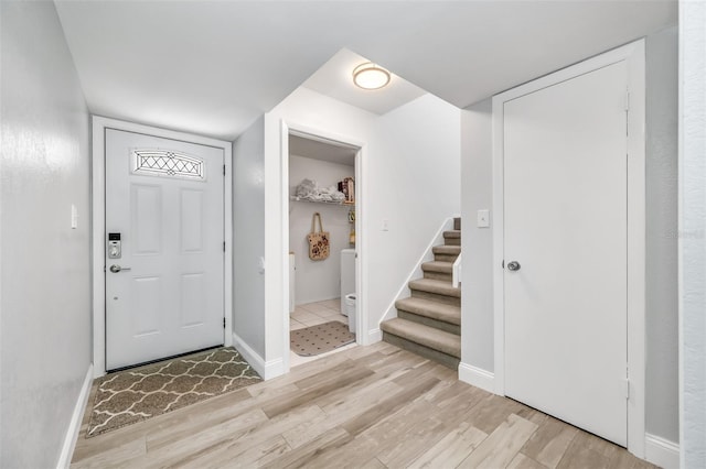 foyer entrance featuring light hardwood / wood-style flooring