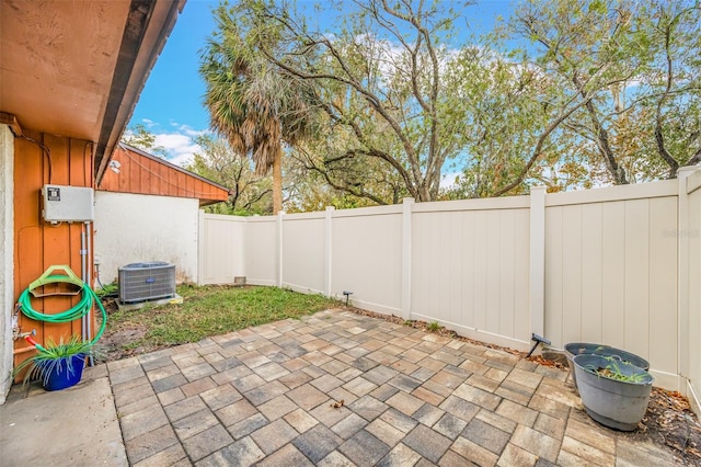 view of patio / terrace featuring a fenced backyard and central AC unit