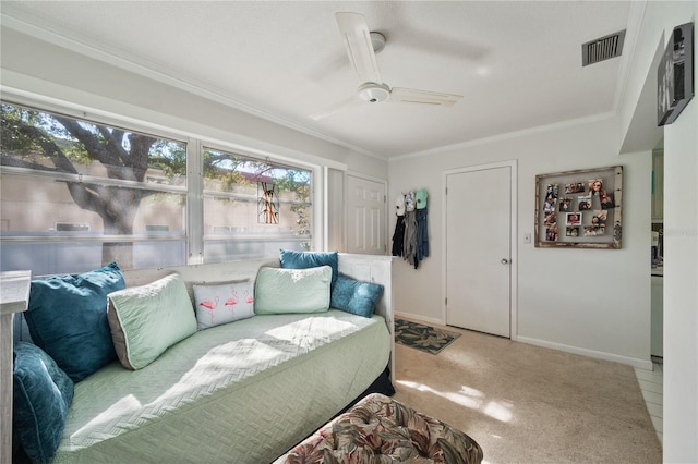 living room with ceiling fan and crown molding