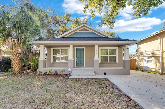 bungalow-style home with a porch