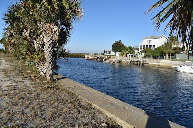 water view featuring a dock