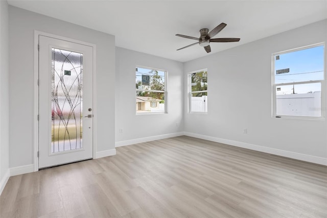 interior space featuring ceiling fan and light hardwood / wood-style flooring