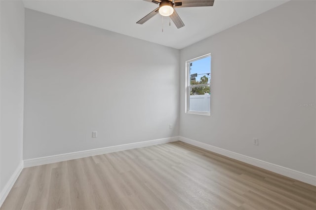 unfurnished room featuring light hardwood / wood-style flooring and ceiling fan