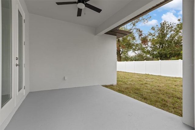 view of patio featuring ceiling fan