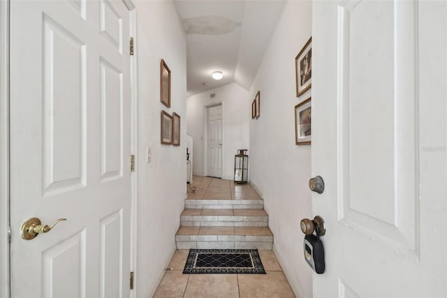 stairs with tile patterned flooring