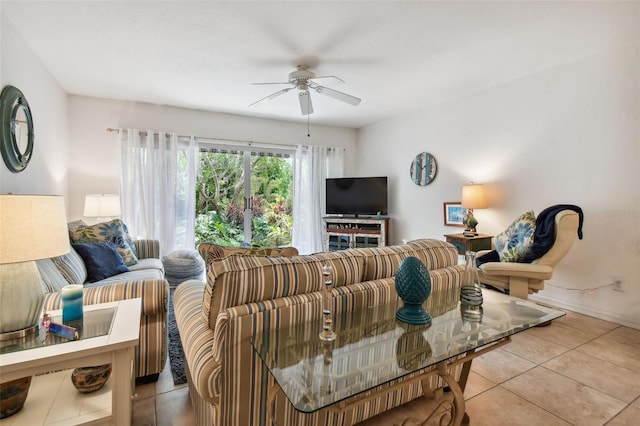 tiled living room with ceiling fan