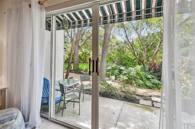 doorway featuring concrete flooring