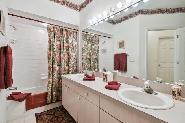 bathroom with tile patterned flooring, vanity, and shower / tub combo