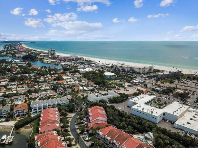 bird's eye view featuring a view of the beach and a water view