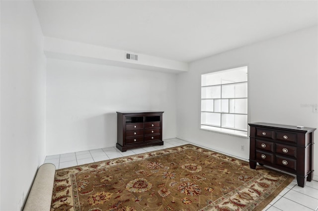 unfurnished bedroom featuring light tile patterned floors