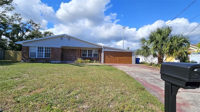 single story home featuring a garage and a front yard