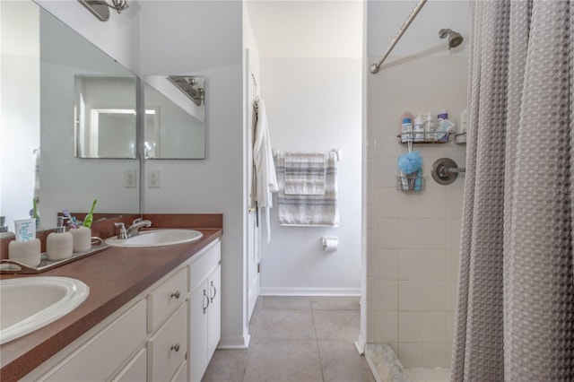 bathroom with tile patterned flooring, vanity, and a shower with curtain