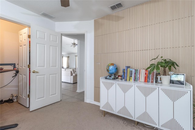 hallway with carpet flooring