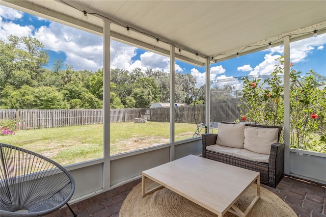 sunroom / solarium with a healthy amount of sunlight