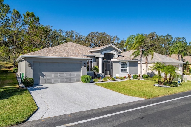 ranch-style home with a garage and a front yard