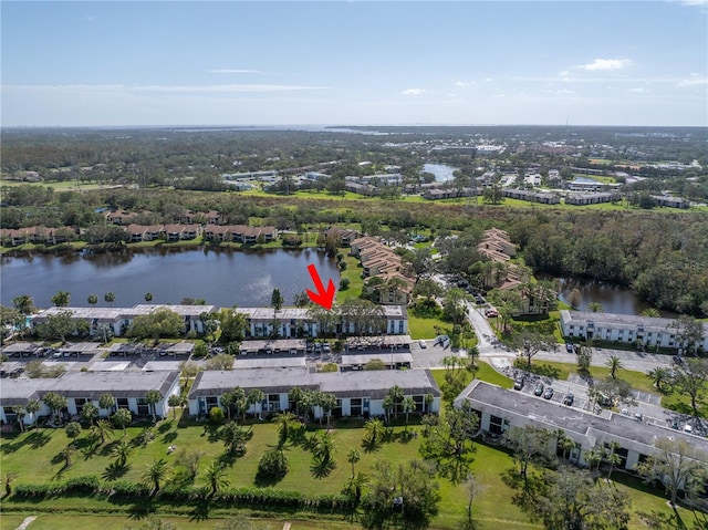 bird's eye view with a water view