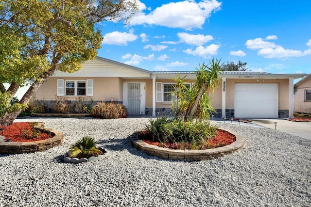 single story home with a garage