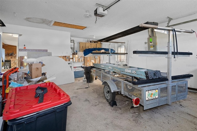 garage with electric panel and a garage door opener