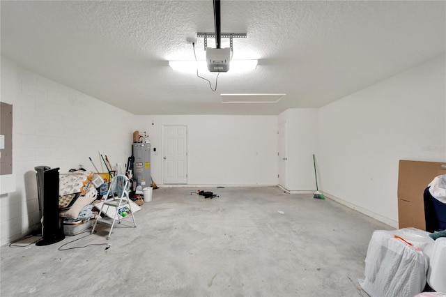 garage with a garage door opener and water heater