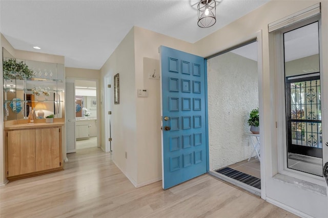 foyer featuring light hardwood / wood-style floors