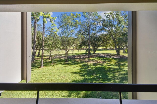 36750 US Highway 19 N Unit 19219, Palm Harbor, FL 34684 - view of green lawn featuring a balcony
