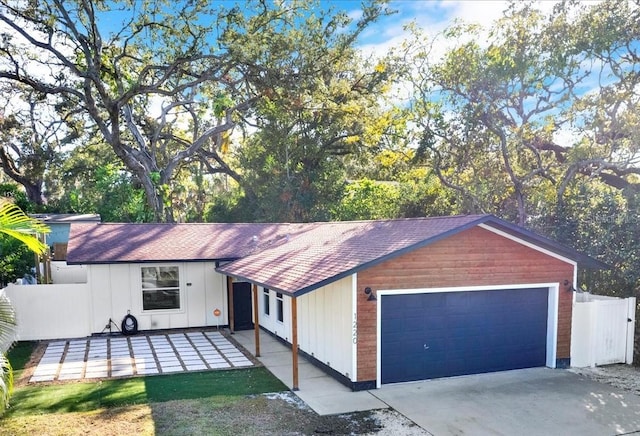 ranch-style home with a garage