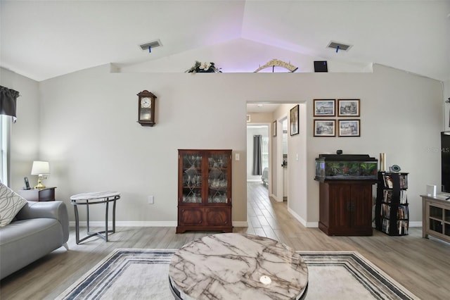 living area with visible vents and light wood-type flooring