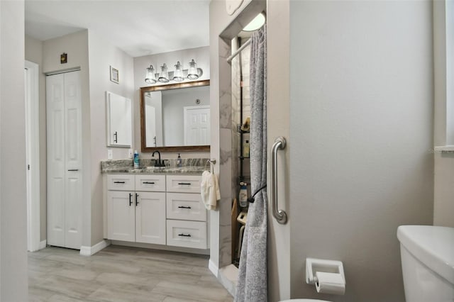 full bath featuring visible vents, toilet, a stall shower, a closet, and vanity