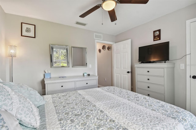 bedroom with a ceiling fan and visible vents