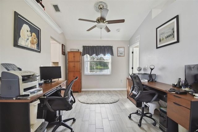 office area with visible vents, baseboards, a ceiling fan, and wood finished floors