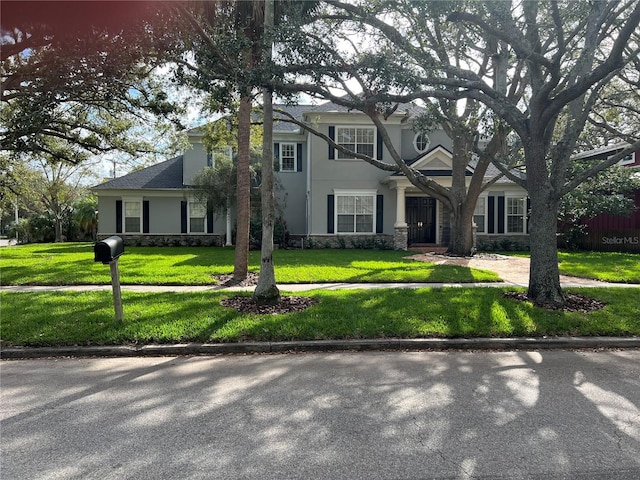 view of front of home with a front yard