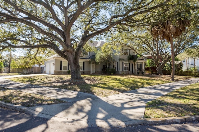 view of front of home with a front yard