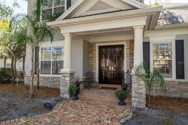 property entrance featuring covered porch