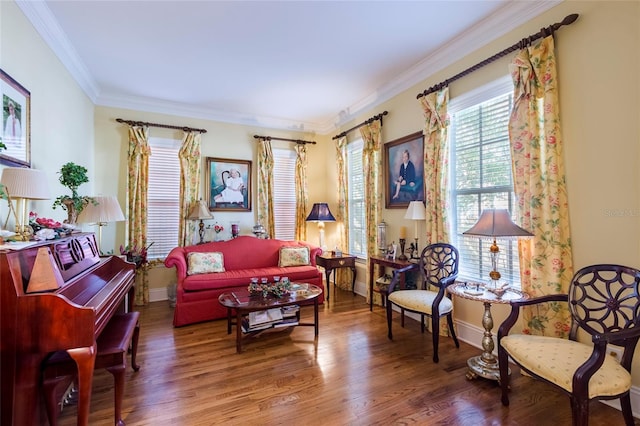 sitting room featuring hardwood / wood-style floors and crown molding