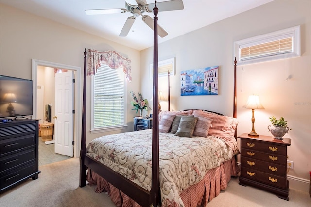 bedroom with light carpet and ceiling fan