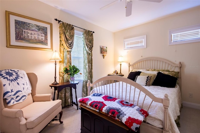 bedroom featuring ceiling fan and light colored carpet