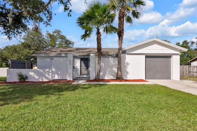 single story home featuring a front yard and a garage