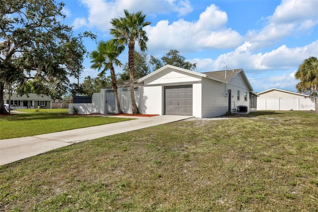 single story home with central air condition unit, a front yard, and a garage