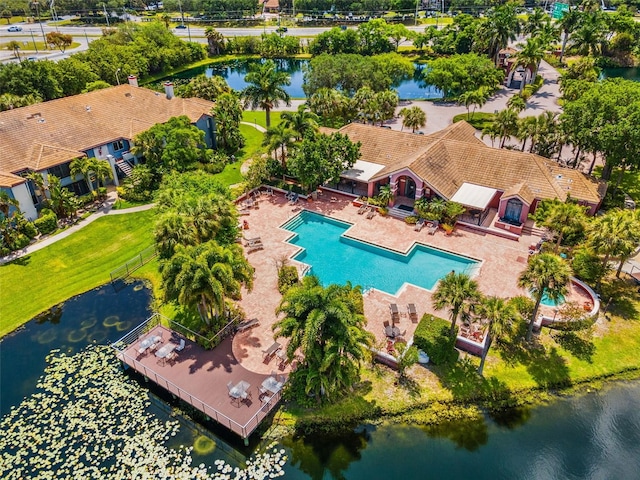 drone / aerial view with a water view