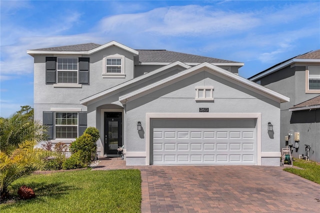 front facade featuring a front yard