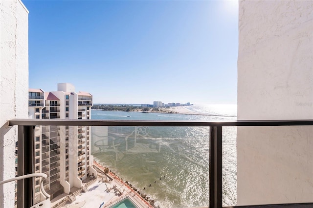 balcony featuring a water view