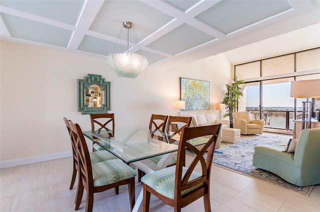 dining space with beamed ceiling, light tile patterned floors, and coffered ceiling