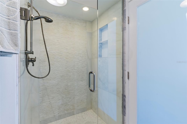 bathroom with an enclosed shower
