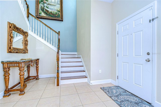 foyer entrance featuring light tile patterned floors