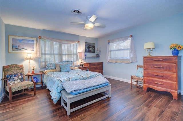 bedroom featuring dark hardwood / wood-style floors and ceiling fan