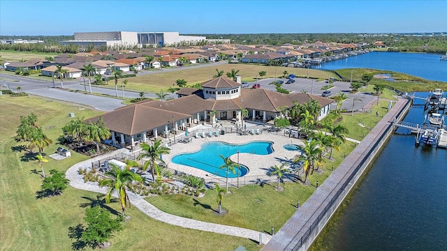 birds eye view of property featuring a water view